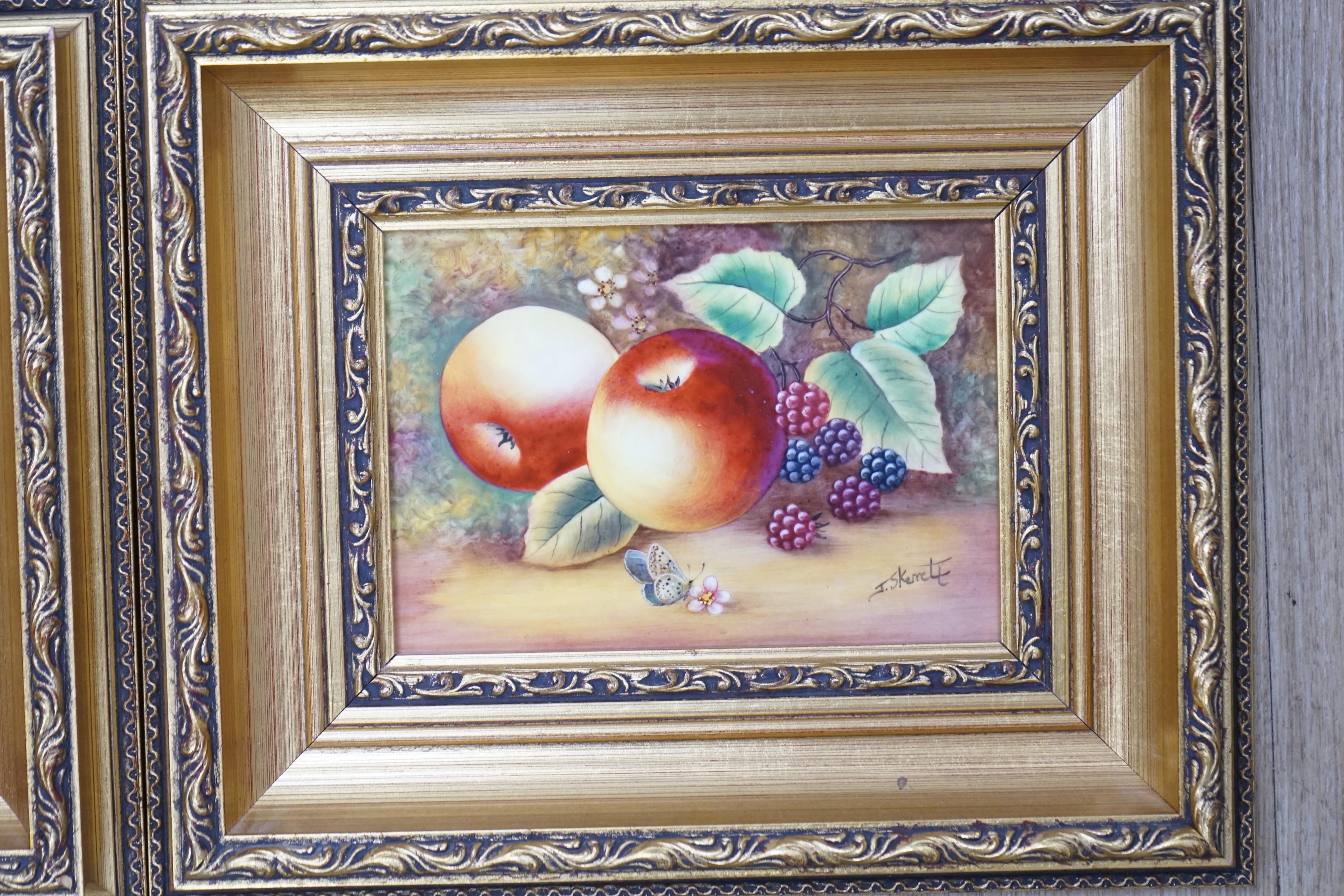 James Skerrett (Royal Worcester artist), pair of hand painted porcelain plaques, Still lifes of fruit, signed, 12 x 17cm